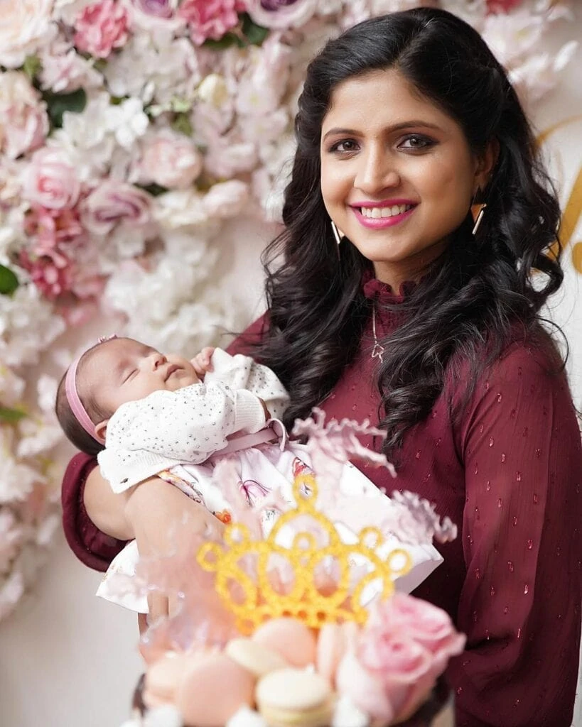 webbabyshower mom with baby during sip and see image from instagram