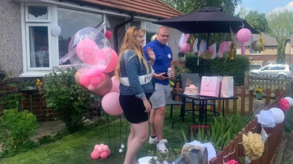 webbabyshower cake is melting due to drive by baby shower under the sun