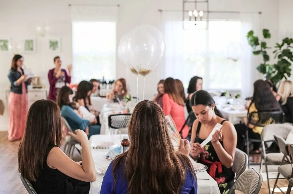 in person baby shower with many guests