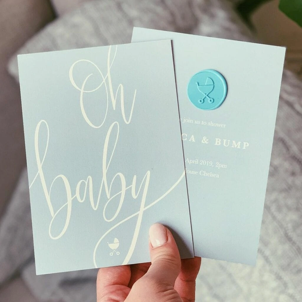 webbabyshower blue baby shower invite with stamp image from instagram