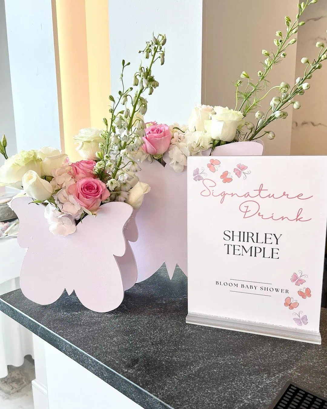 a picture of a butterfly baby shower organized by whimsigalballoons in new jersery