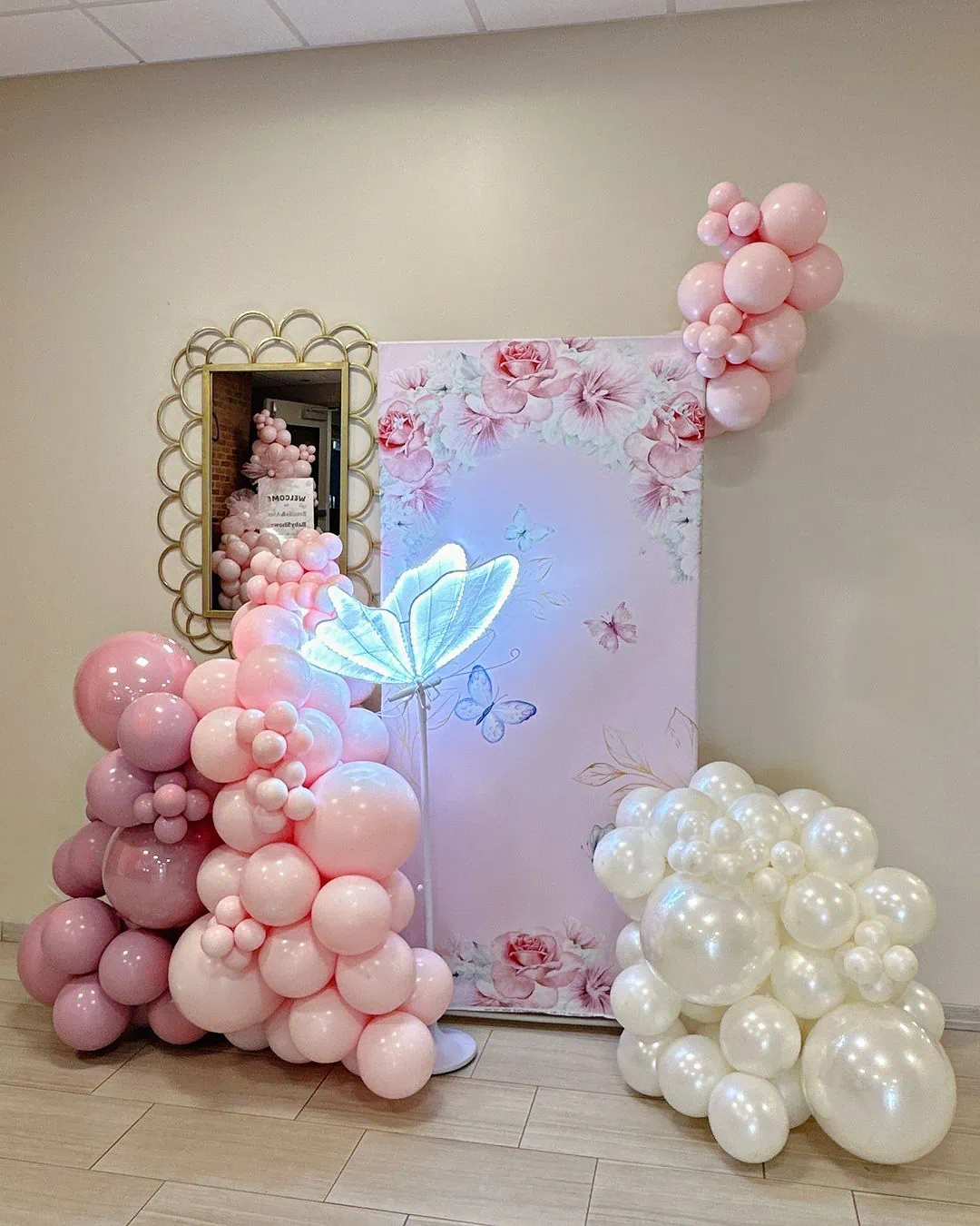 a picture of a butterfly baby shower organized by yakiedecor in tampa