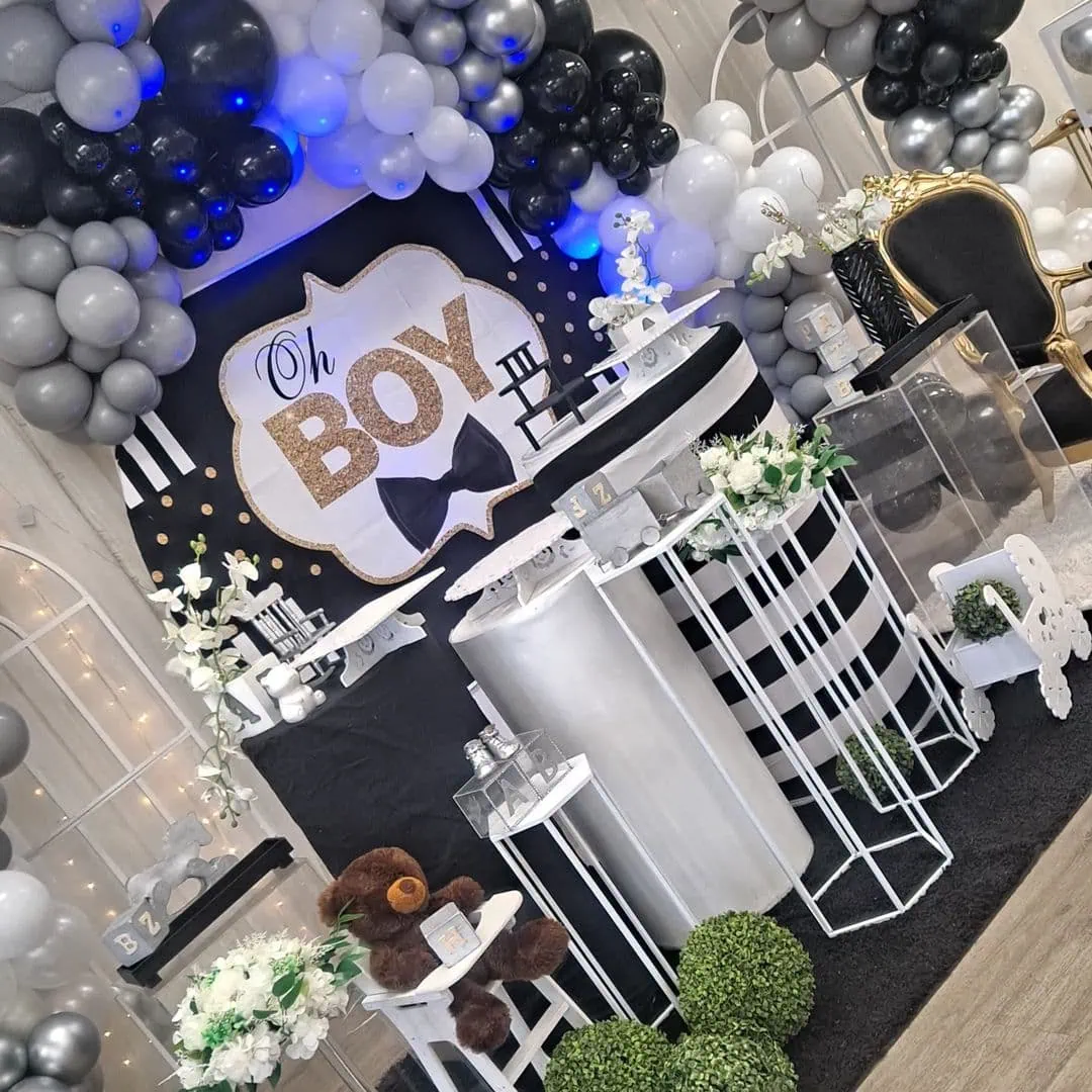 a picture of a little man baby shower organized by Red Balloon Events in Massachusetts