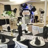 a picture of a little man baby shower organized by Red Balloon Events in Massachusetts